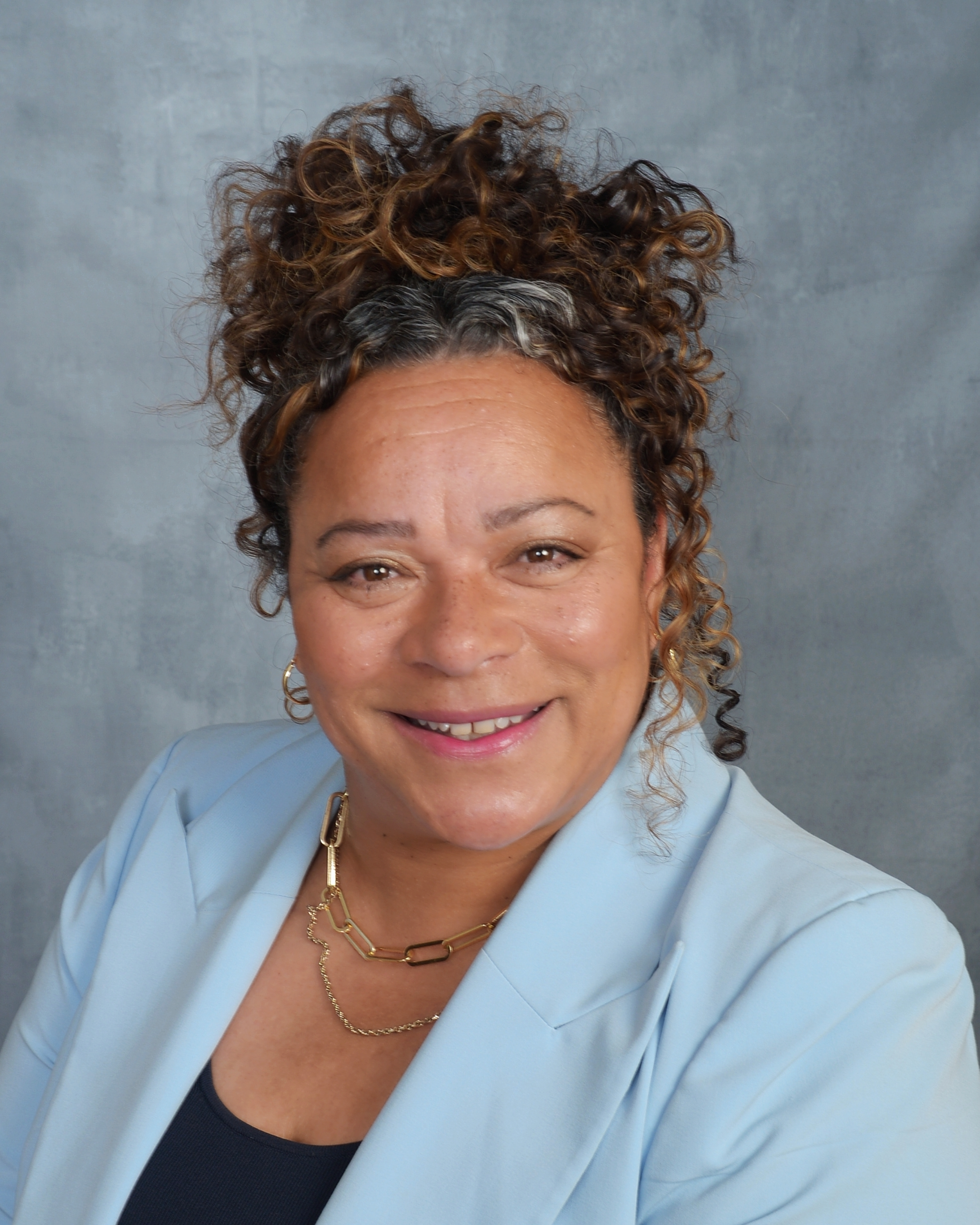 Maureen Rosado Headshot